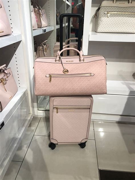 michael kors duffle bag womens|Michael Kors trolley suitcase.